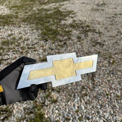 Chevrolet Bowtie emblem in reflective silver and gold finish