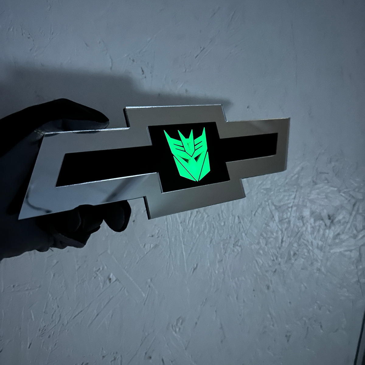 Chevy Bowtie Decepticon emblem with reflective silver finish and black center