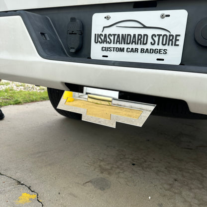 Chevy truck hitch cover featuring silver and gold Bowtie emblem design