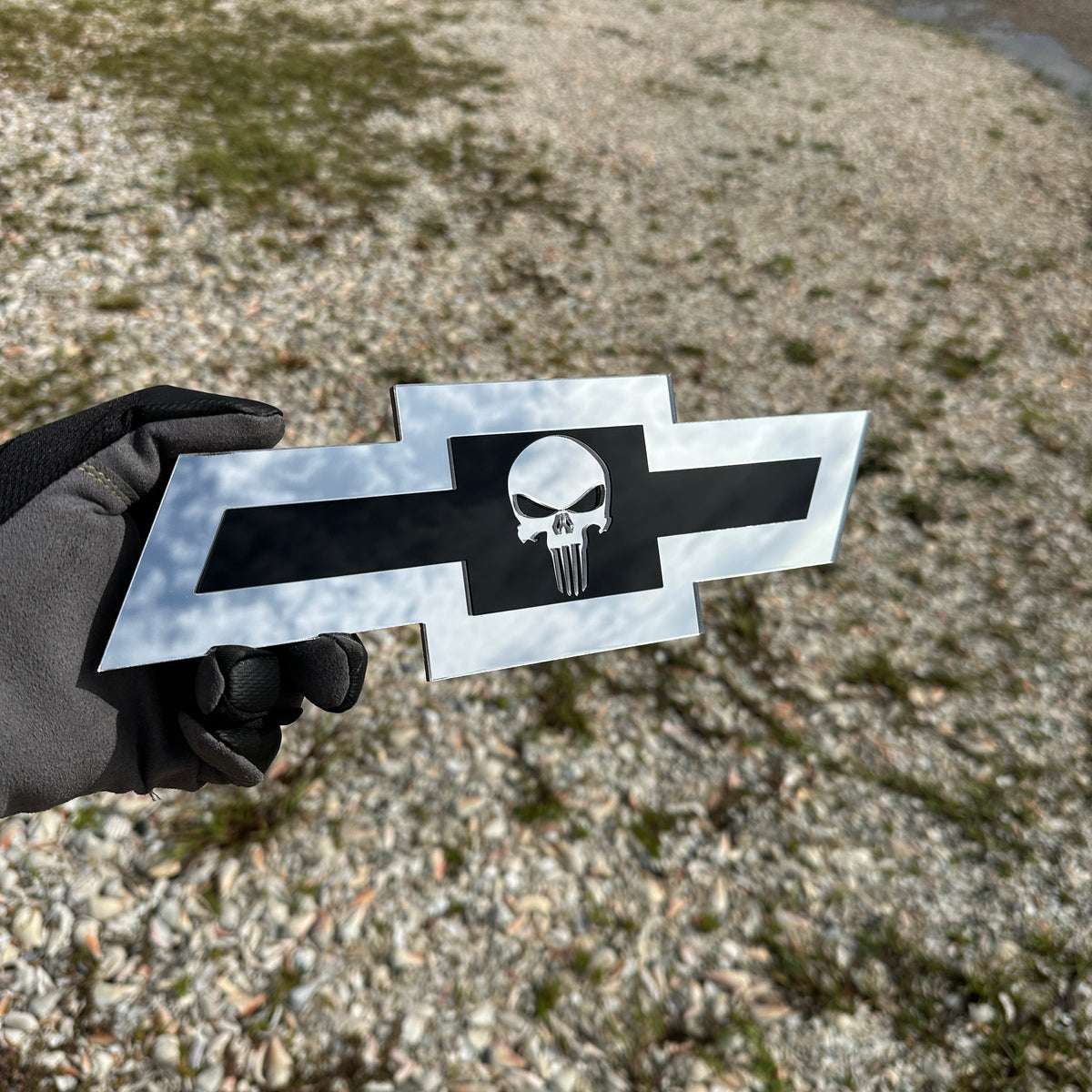 Custom Chevy Bowtie Punisher Skull badge with layered silver and black design