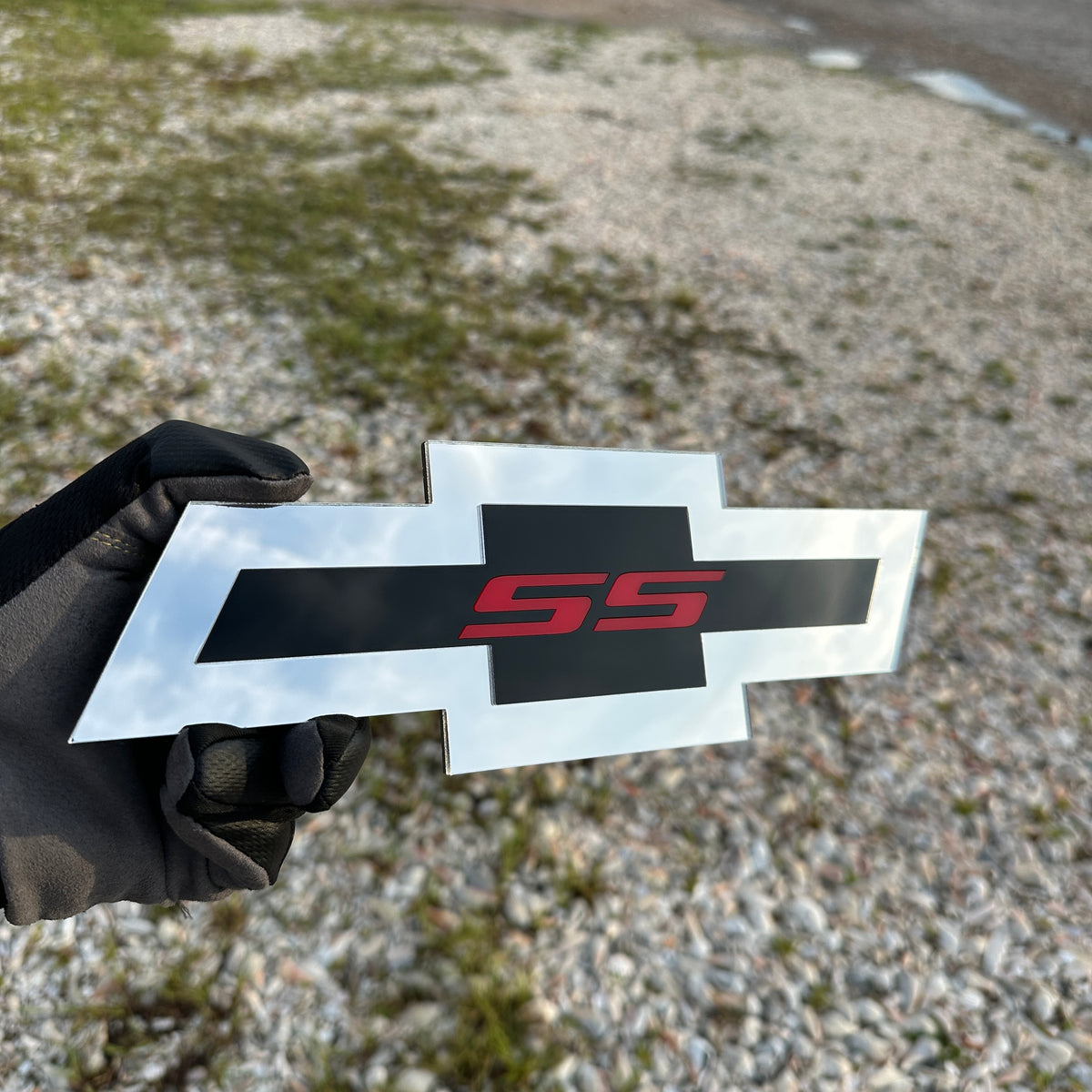 design.jpg
Chevrolet SS car badge with Bowtie design and red SS logo