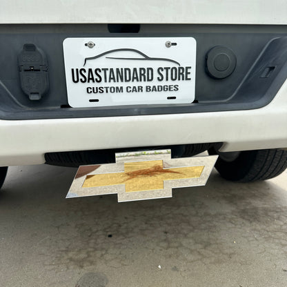 Custom Chevrolet Bowtie hitch emblem with gold center and silver backing