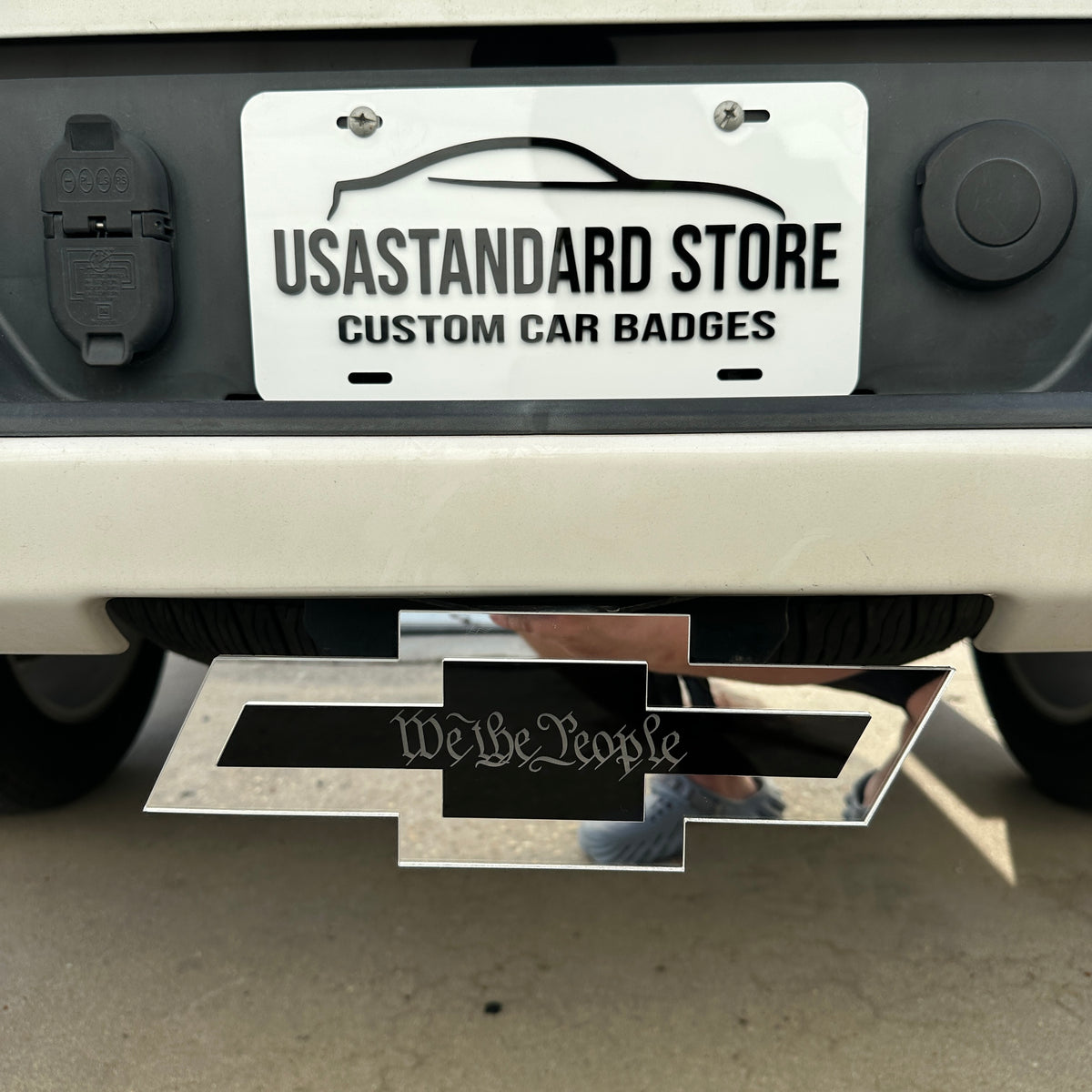 Chevrolet Bowtie patriotic hitch cover with We the People script design