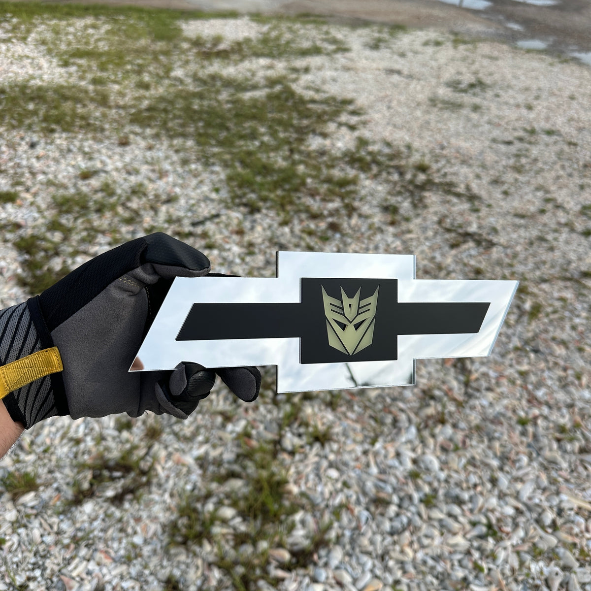 Chevy Bowtie car badge in silver with glow Decepticon emblem and black center