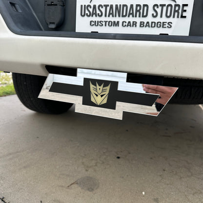 Decepticon Chevy hitch cover with reflective silver Bowtie shape