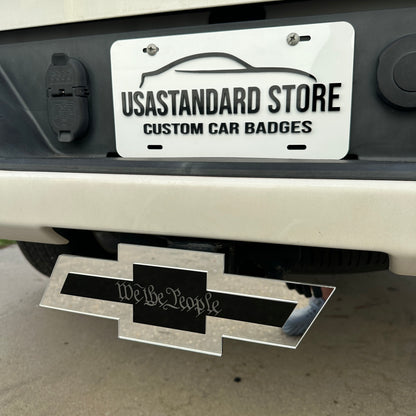 We the People Chevy Bowtie hitch cover mounted on rear truck receiver