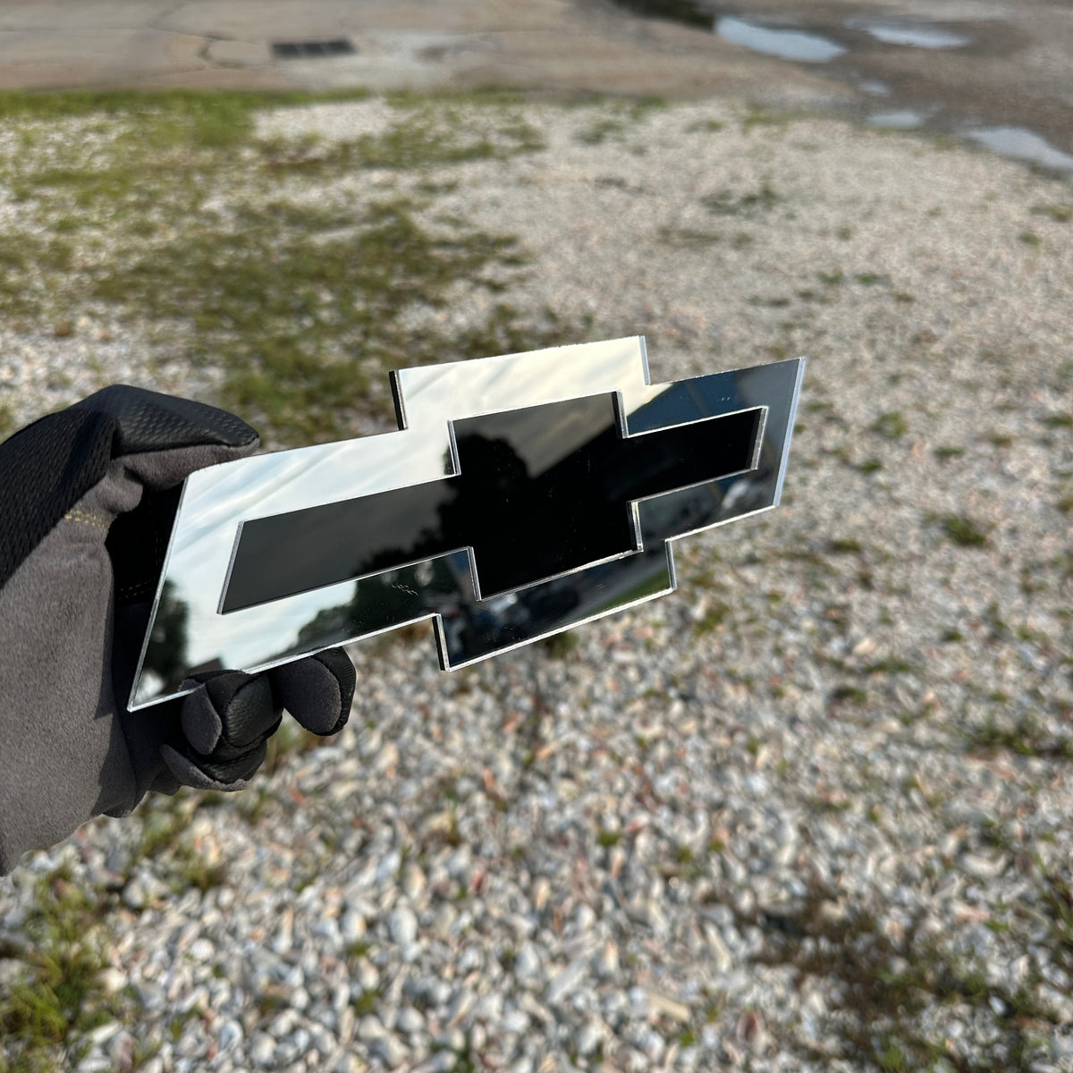 Custom Chevy Bowtie car badge with silver finish and black insert