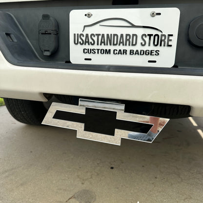 Custom Chevrolet Bowtie hitch emblem in silver and black for truck exterior