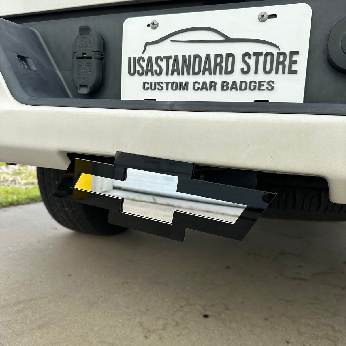 Chevy truck hitch cover featuring black and silver Bowtie emblem design
