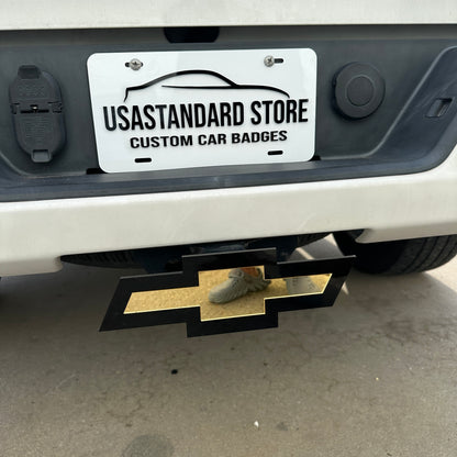Custom Chevy Bowtie hitch cover with gold emblem and black outline