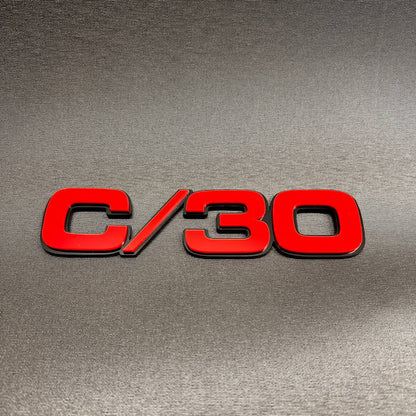 Multicolor Chevy C/30 truck fender emblem badge with custom billet style.