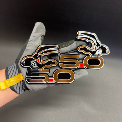 Coyote 5.0 mirror silver fender badge for Ford Mustang GT and compatible Ford F-150 applications with custom layered design.