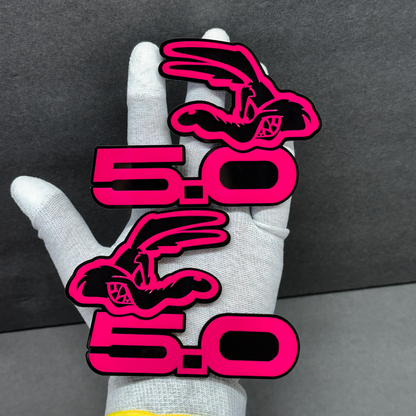 Coyote 5.0 car emblem badge – pink acrylic top layer with black base