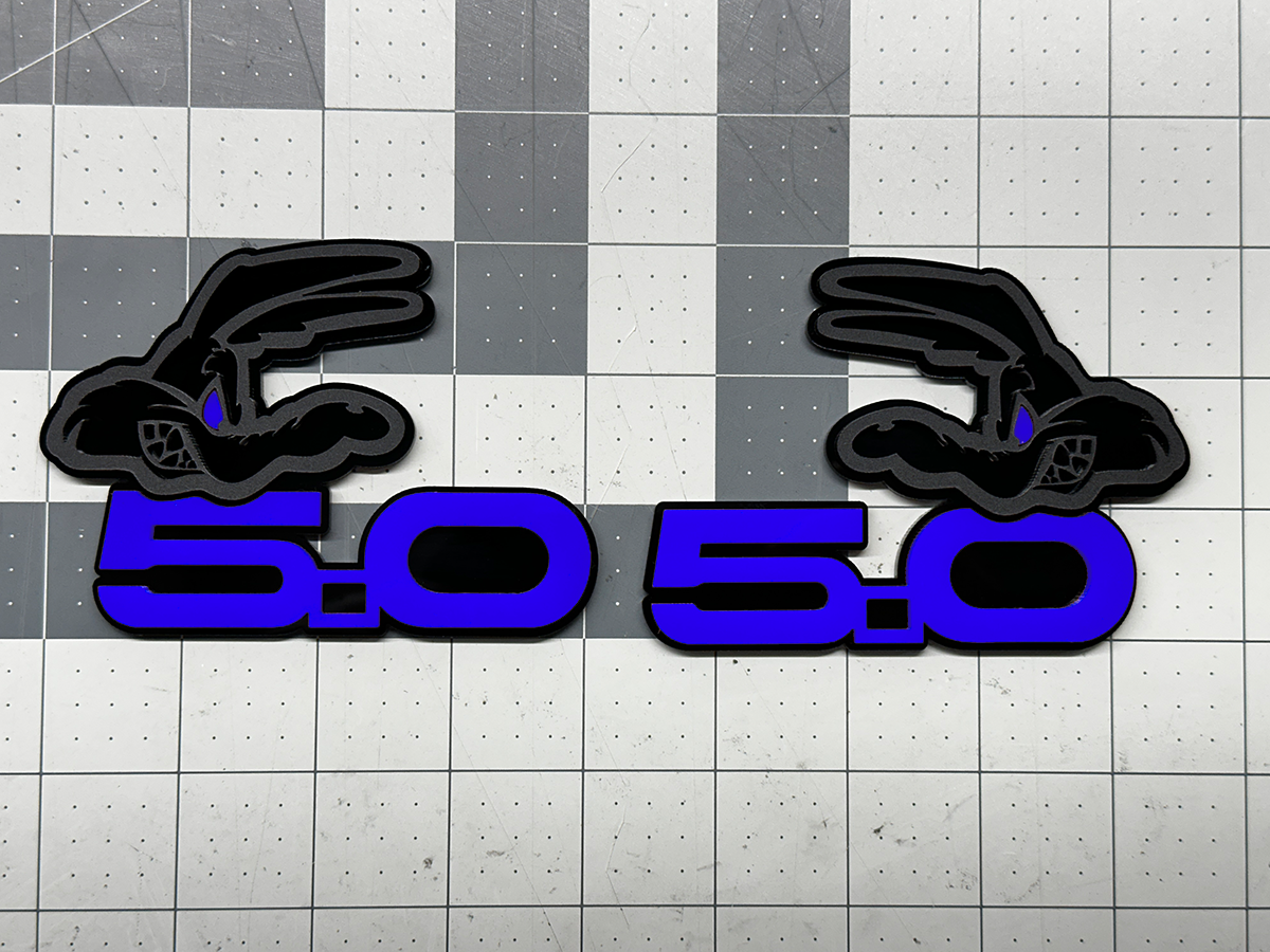 Coyote 5.0 emblem matte black with blue top layer