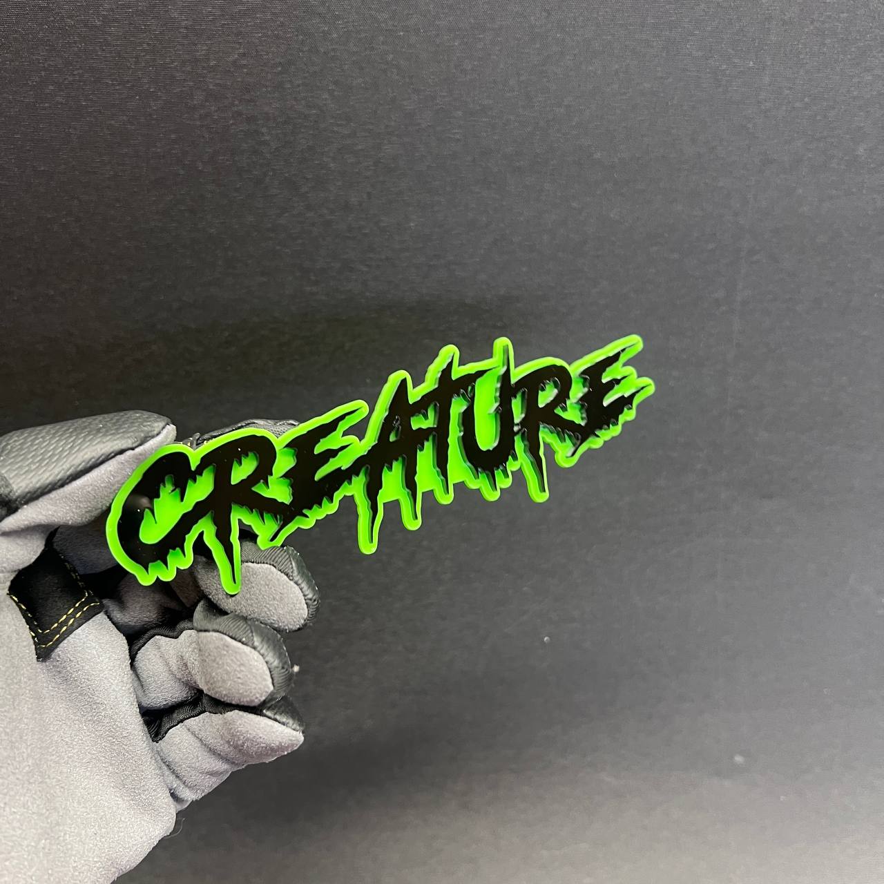 CREATURE custom text car badge in green and black graffiti style