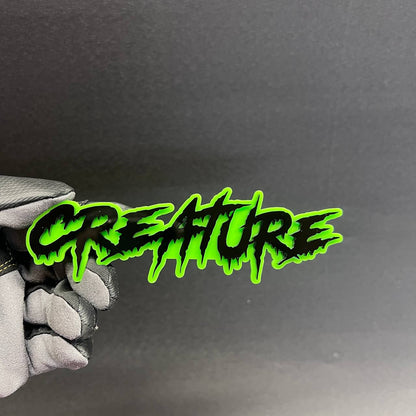 Custom CREATURE car emblem with bold graffiti lettering