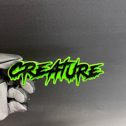 Custom CREATURE car emblem with bold graffiti lettering