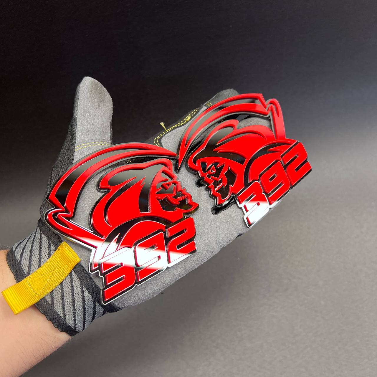 Double layered 392 Reaper car badge with bold red and black finish
