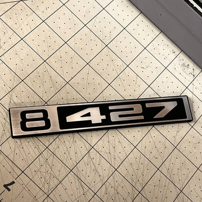 Classic Chevy C10 B 427 silver billet emblem for custom truck exterior styling.