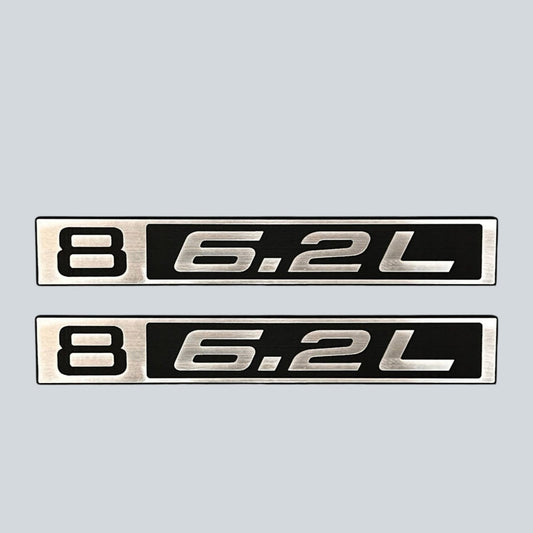 Classic Chevy truck 6.2L custom fender emblem in brushed silver and black finish.