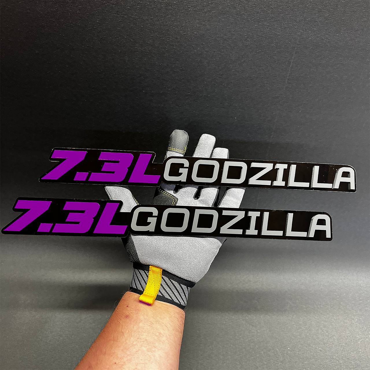 Ford 7.3L Godzilla V8 matte badge with bold custom fender emblem design.