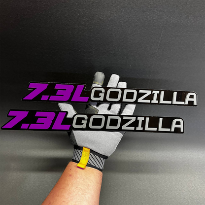 Ford 7.3L Godzilla V8 matte badge with bold custom fender emblem design.