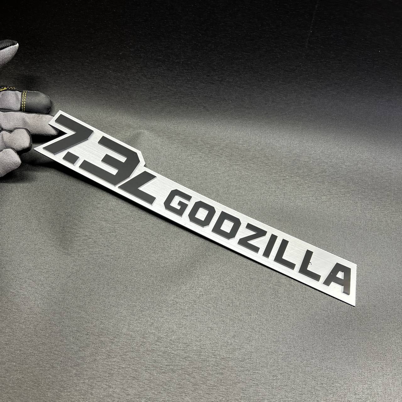 7.3L Godzilla V8 fender badge made for performance-inspired Ford truck exterior decor.