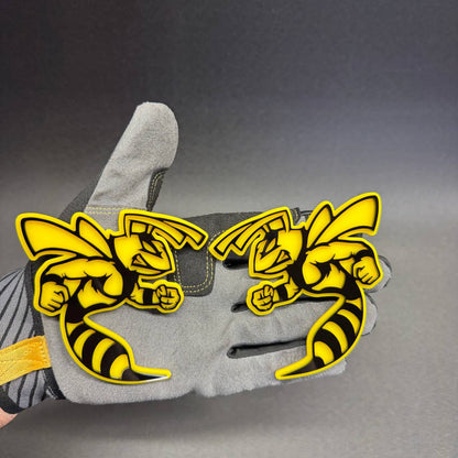 Custom racing bee fender emblem with glossy black and yellow layered design for Dodge Ram 1500 truck accessories.