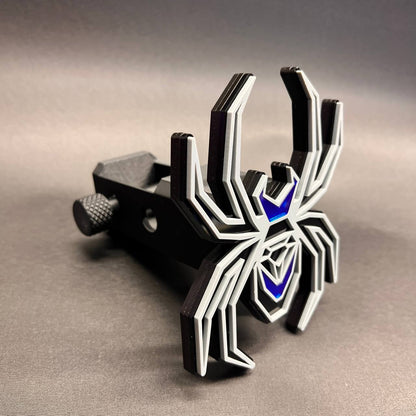 Gray on black spider hitch cover with reflective mirror blue body accents for cars and trucks.