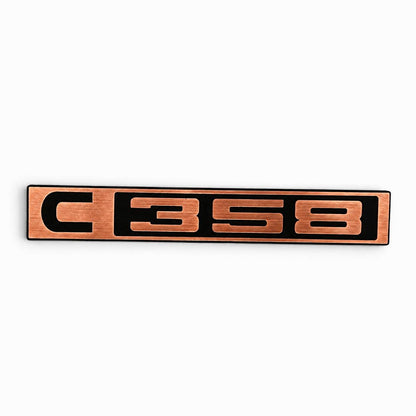 Classic Chevy C10 custom C358 front emblem in silver billet style.