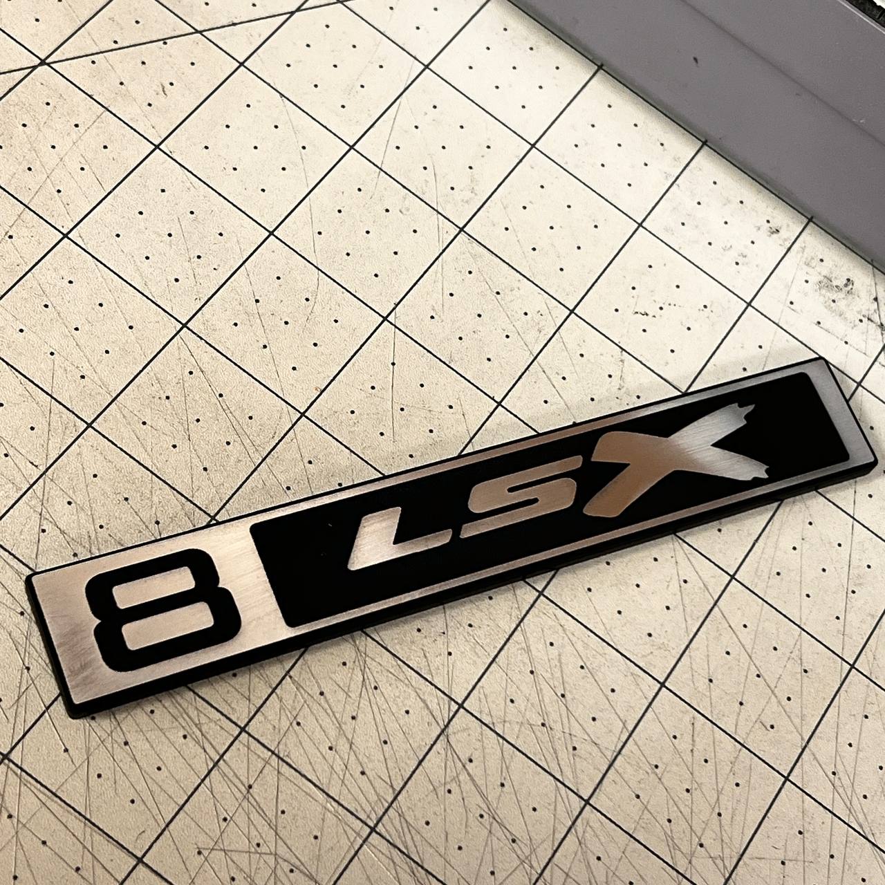Classic Chevy C10 truck front badge with custom B LSX silver design