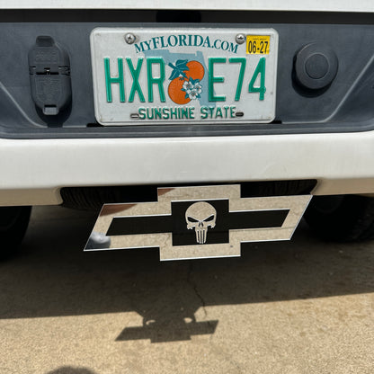 Chevy Bowtie Punisher hitch cover mounted on rear truck receiver