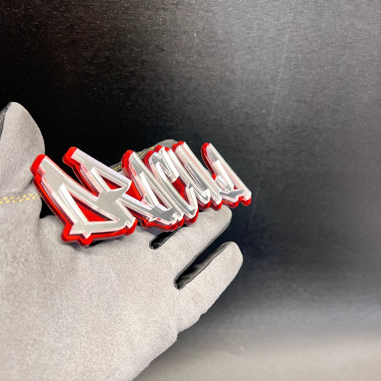 Mirror silver DRACULA car badge with layered red border and graffiti-style design