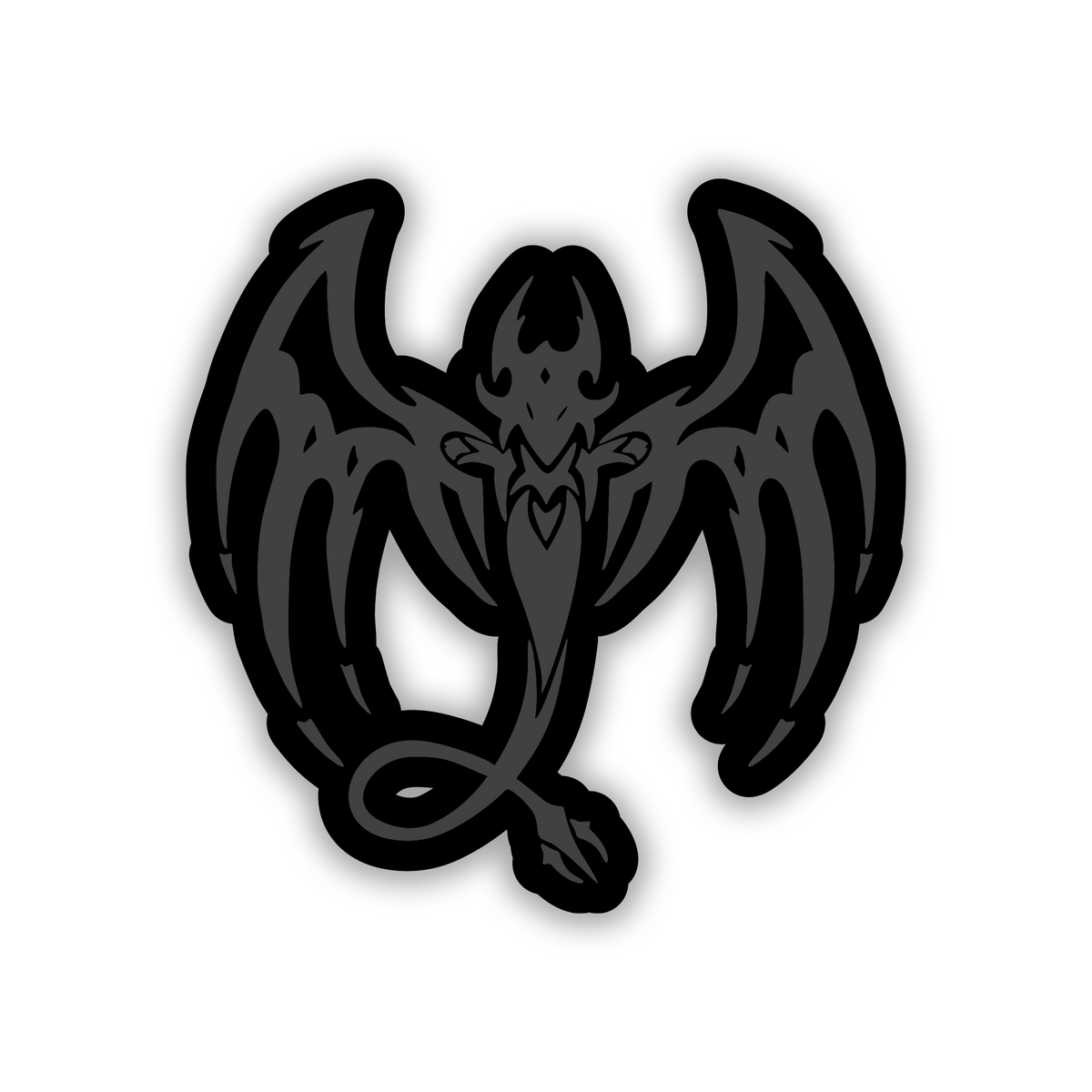 Engraved devil car badge featuring detailed wings on brushed silver surface
