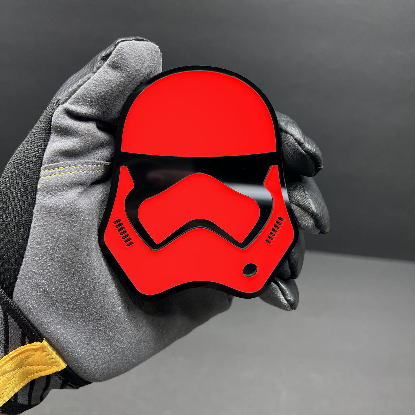 Detailed laser cut helmet badge edges