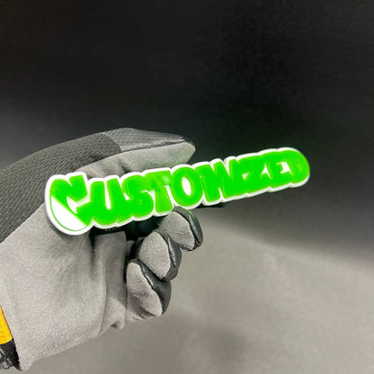 Green and white custom text emblem for automotive exterior styling