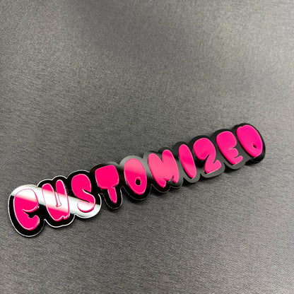 3D printed personalized car emblem with bold graffiti font design