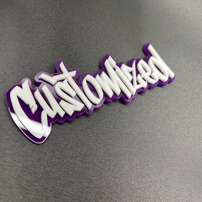 Purple and white custom name car emblem with glossy finish