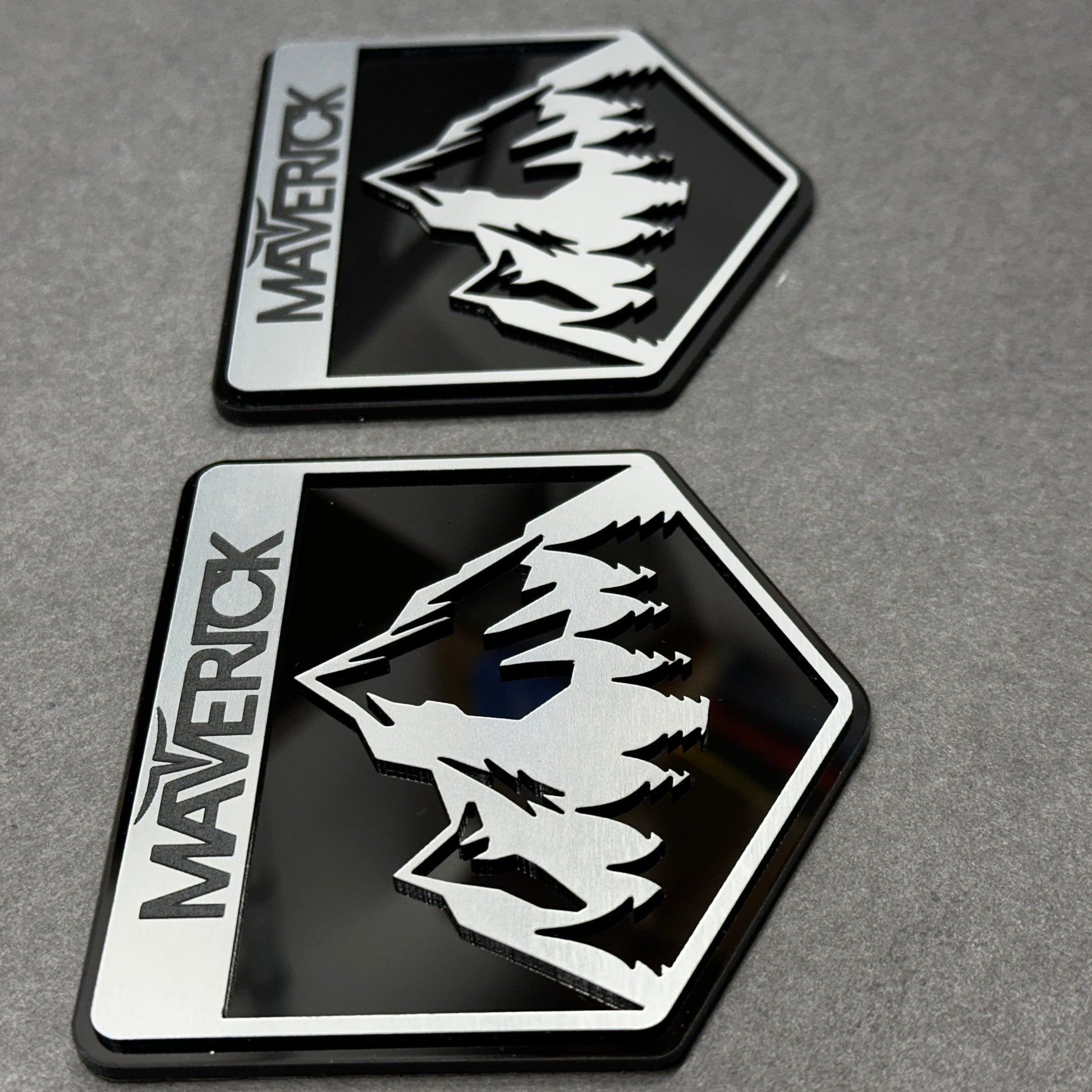 Gloss black and brushed silver Maverick Ford fender badge set