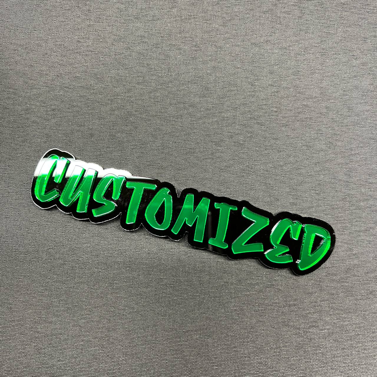 Personalized vehicle badge with green mirror acrylic on black base