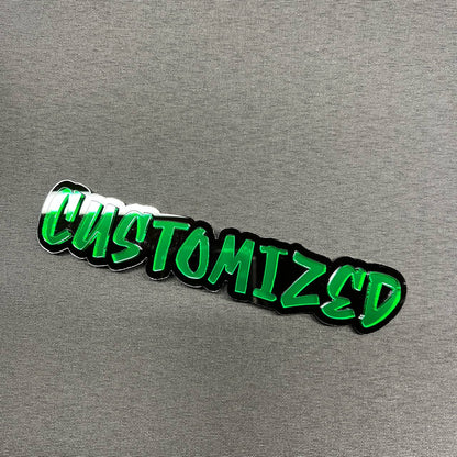 Personalized vehicle badge with green mirror acrylic on black base