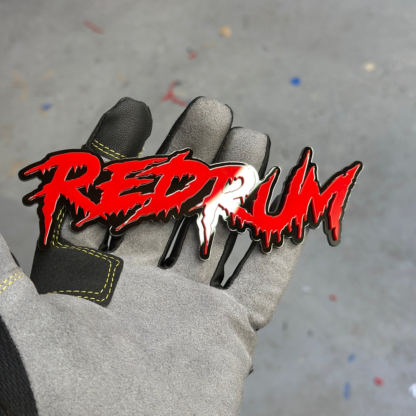 Custom Red Rum text car badge with aggressive horror drip design