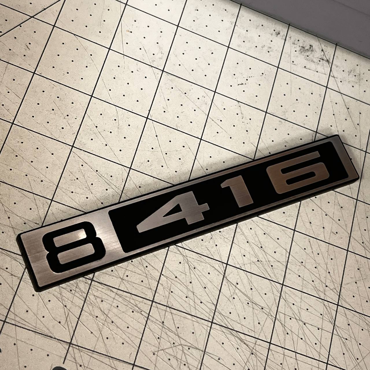 Custom 416 silver billet style car badge fender emblem for Chevy C10 truck exterior trim.