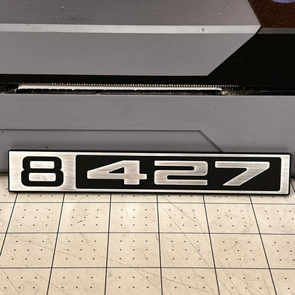 Silver and black Chevy C10 B 427 custom front emblem for classic 1967-1972 trucks.