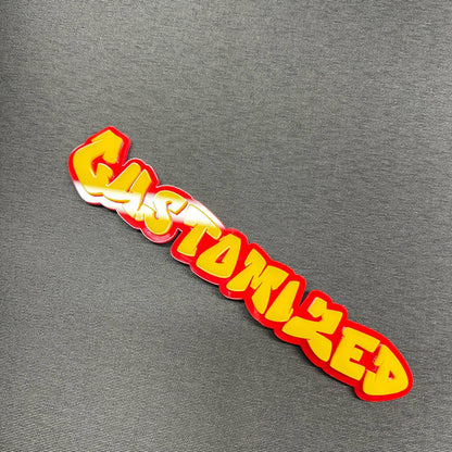 Custom acrylic name badge in graffiti font style for vehicles.