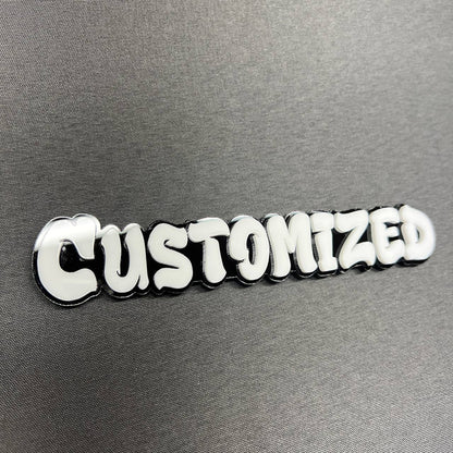 White and black customized graffiti badge for car exterior