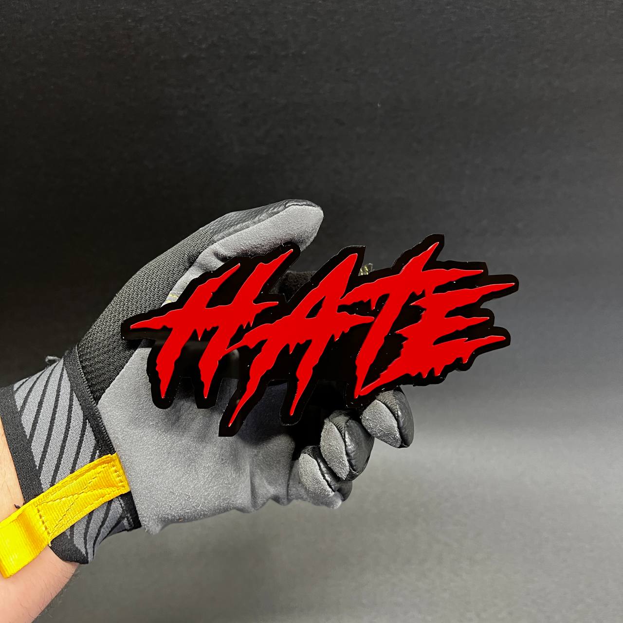 Sharp red and black HATE badge for truck, car, toolbox, or custom display.