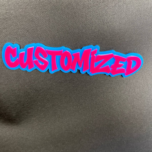 Custom car badge emblem featuring bold graffiti font lettering