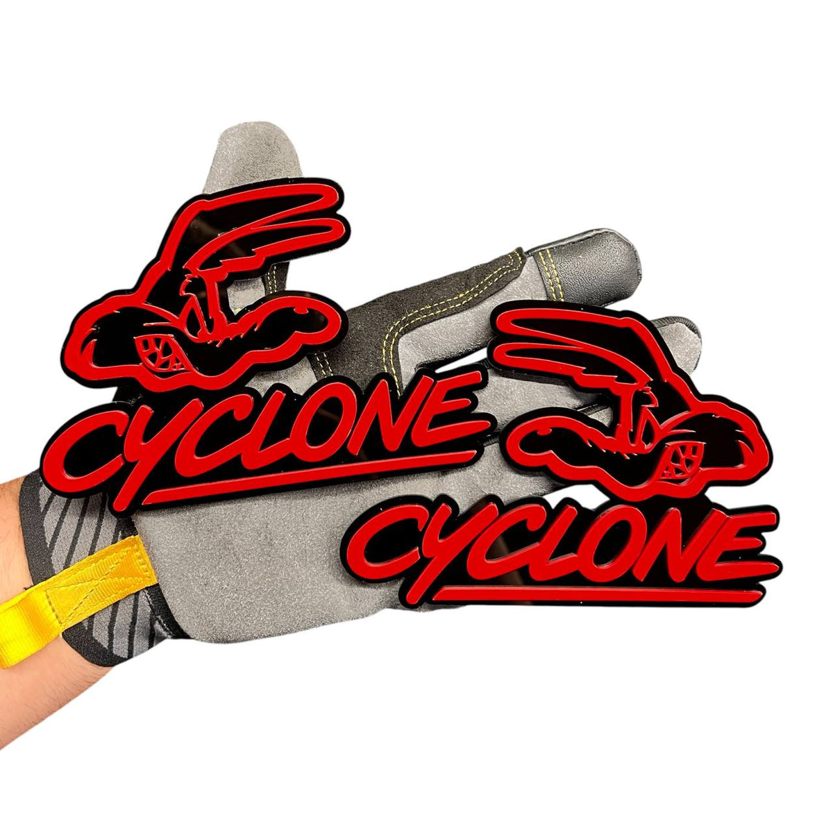 Cyclone car badge emblem in gray and black for automotive fender or exterior customization.