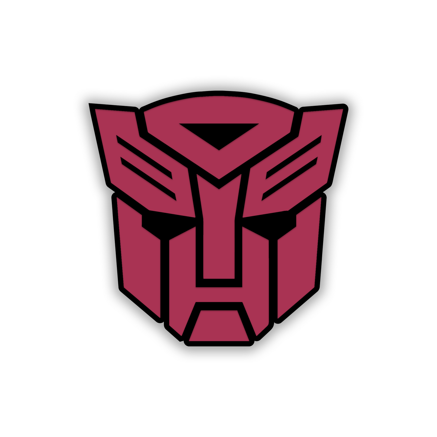Engraved Decepticon automotive emblem with detailed robotic face design